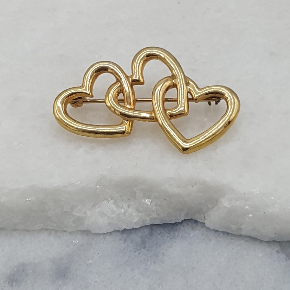 Gold Brooch Features Three Interlocking Heart Sha… - image 1